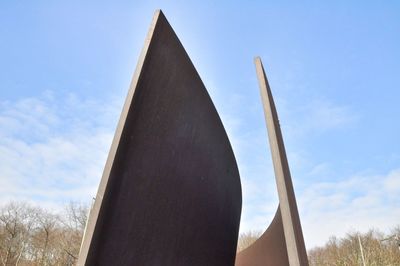 Low angle view of built structure against blue sky
