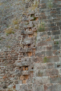 Low angle view of brick wall