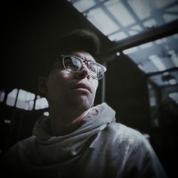 Portrait of young man looking away