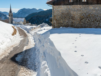 Winter magic. the ancient wooden houses of sauris di sopra. italy