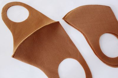 High angle view of paper against white background