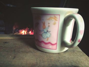 Close-up of coffee cup on table