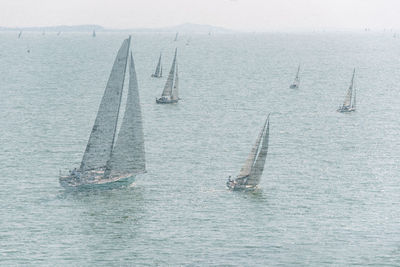 High angle view of sailboat sailing on sea