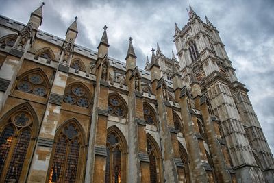 Low angle view of cathedral against cloudy sky