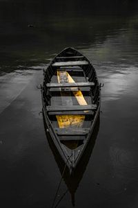 High angle view of boat moored in lake