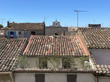 Houses against sky in city
