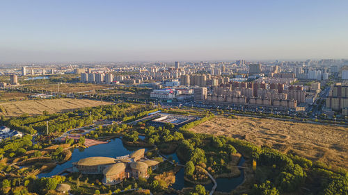 High angle view of cityscape against clear sky