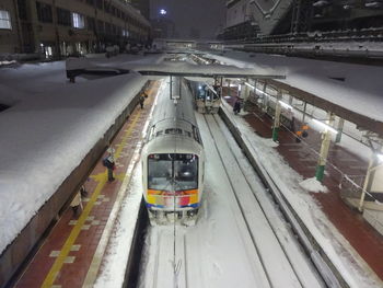High angle view of train in city during winter