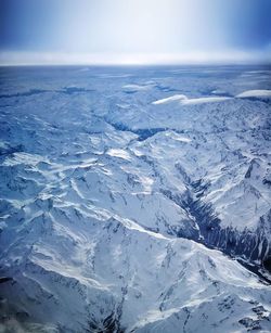 Scenic view of snowcapped mountain against sky