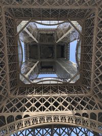 Low angle view of ceiling of eiffel tower