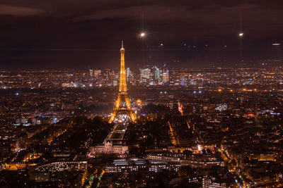 Illuminated buildings in city at night