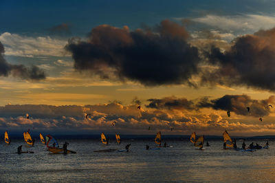 Scenic view of sea against sky at sunset