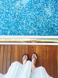 Low section of woman in swimming pool