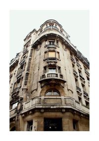 Low angle view of old building against clear sky