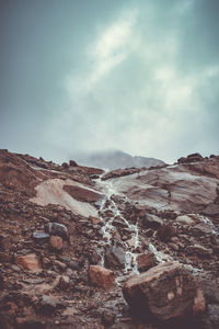 Scenic view of rock formations against sky