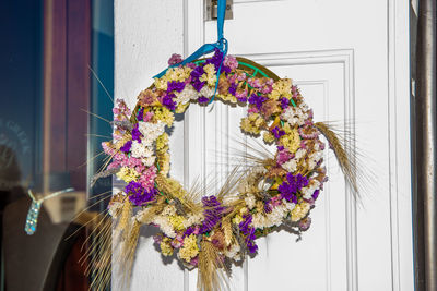 Flower crown decoration on a white door