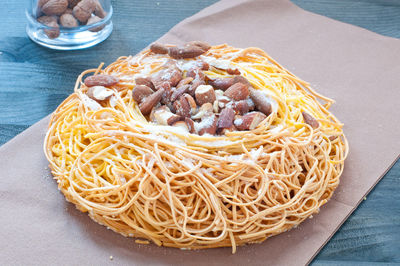 High angle view of noodles in plate on table