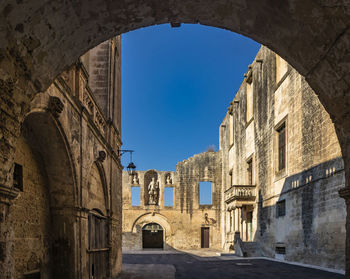 View of old building against blue sky