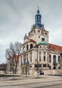 View of building against cloudy sky