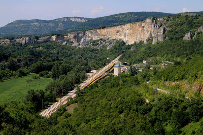 High angle view of trees and mountains against sky