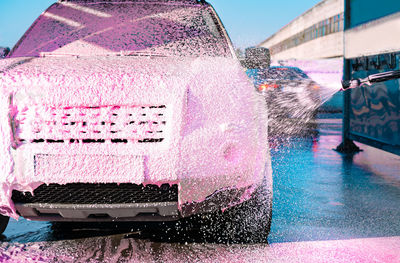 Car wash with pink foam
