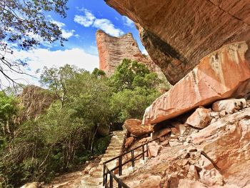 Low angle view of rock formations on landscape