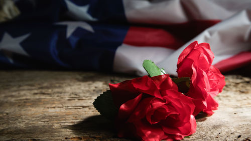 Close-up of rose petals on table