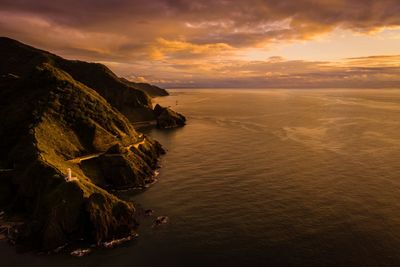 Scenic view of sea against sky during sunset