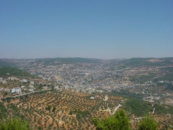 Aerial view of townscape against sky