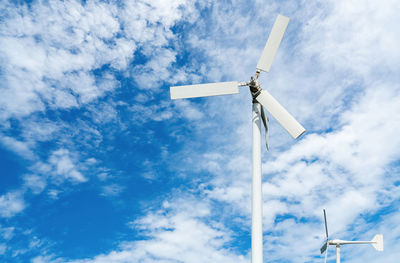 Wind turbine at wind farm on blue sky. alternative and renewable energy concept. sustainable.