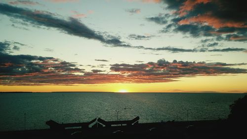 Scenic view of sea at sunset
