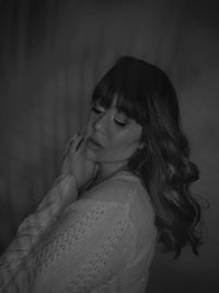 Portrait of young woman with eyes closed