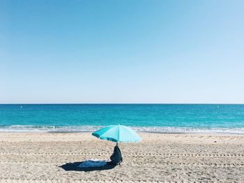 Scenic view of sea against clear sky