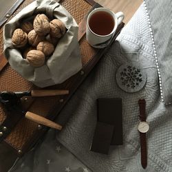 Close-up of objects on bed