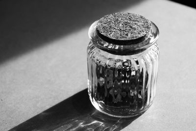 Close-up of glass jar on table