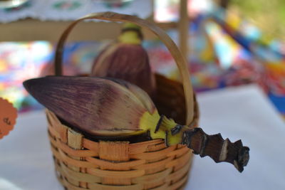 Close-up of wicker basket on table at market