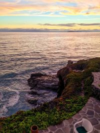 Scenic view of sea at sunset