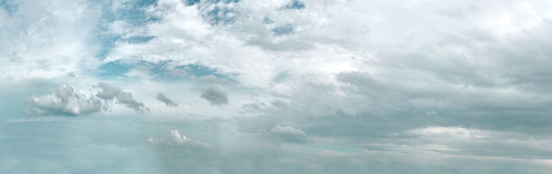 Low angle view of dramatic sky over sea