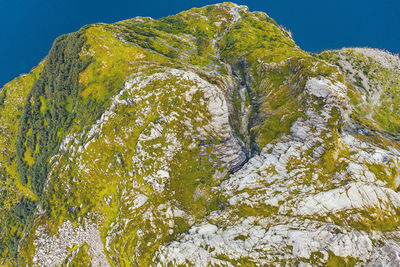 Low angle view of rocks against sky