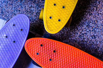 Close-up high angle view of basketball skateboards