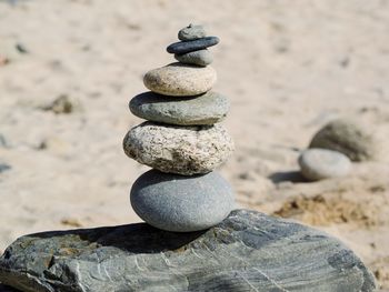 Close-up of stone stack on rock