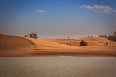 Scenic view of desert against sky