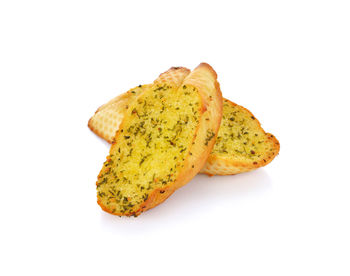 High angle view of bread against white background