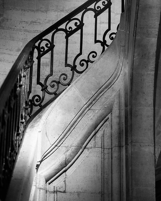 indoors, architecture, built structure, pattern, low angle view, design, wall - building feature, building, railing, no people, staircase, art and craft, art, steps and staircases, ceiling, creativity, day, close-up, wall, steps