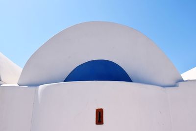 Low angle view of built structure against blue sky