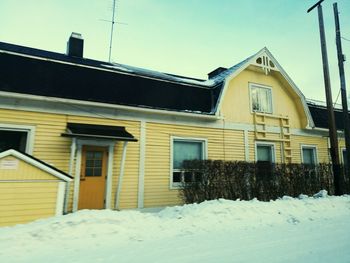 House against sky during winter