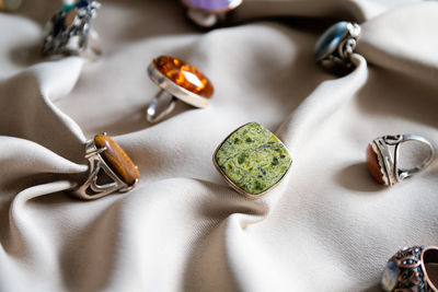 Close-up of wedding rings on table