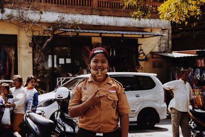 Woman standing in city