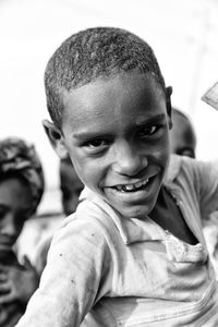 Close-up portrait of smiling boy