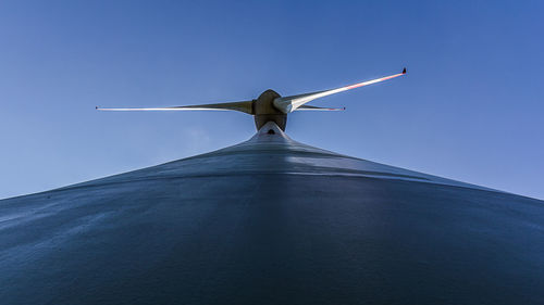 Airplane against blue sky